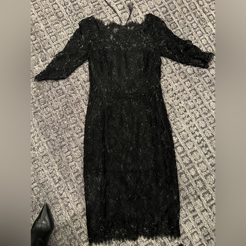 Kalinka designer black lace dress.